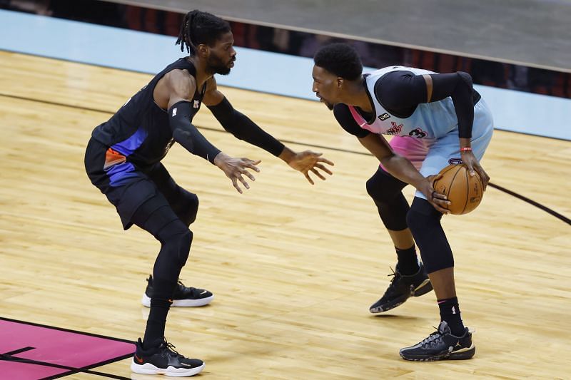 Bam Adebayo #13 is defended by Nerlens Noel #3.