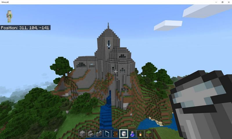 Shaping the castle as per the hill (Image via Mojang)