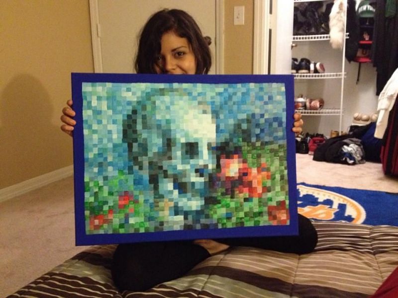 Person with a real life Minecraft painting (Image via Pinterest)