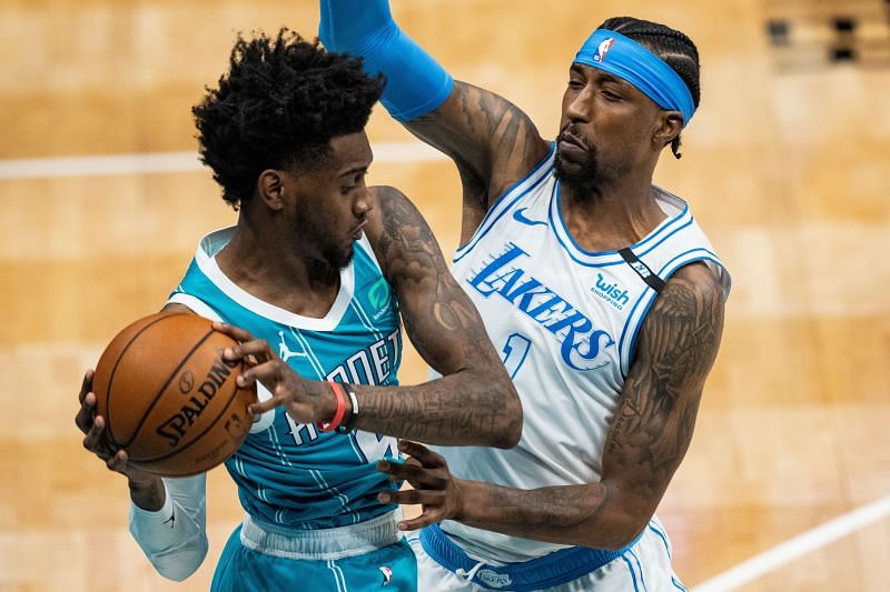 Jalen McDaniels #6 is guarded by Kentavious Caldwell-Pope #1