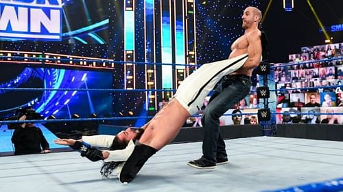 Cesaro swings Seth Rollins (Credit: WWE)