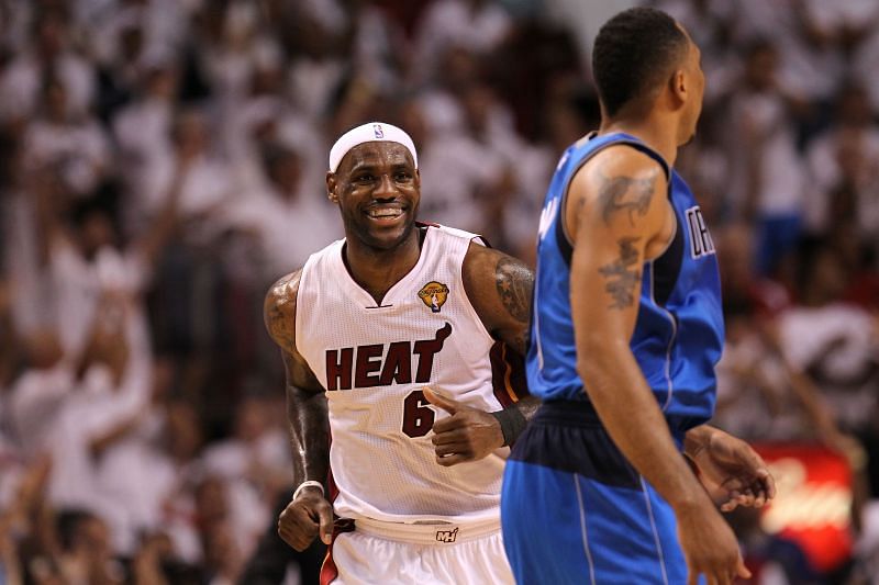 LeBron James #6 of the Miami Heat reacts as he runs by Shawn Marion #0 of the Dallas Mavericks in the first half of Game 2 of the 2011 NBA Finals.