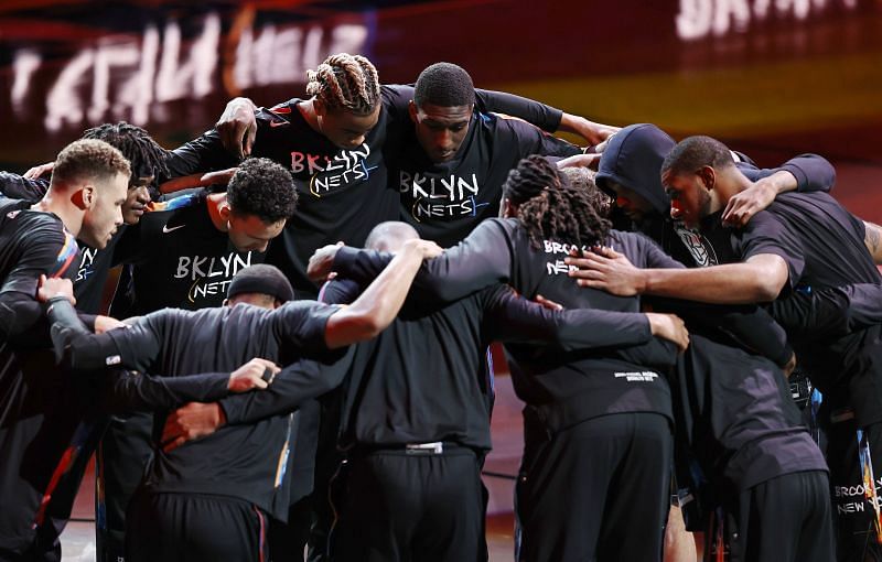 The Brooklyn Nets huddle before the game.