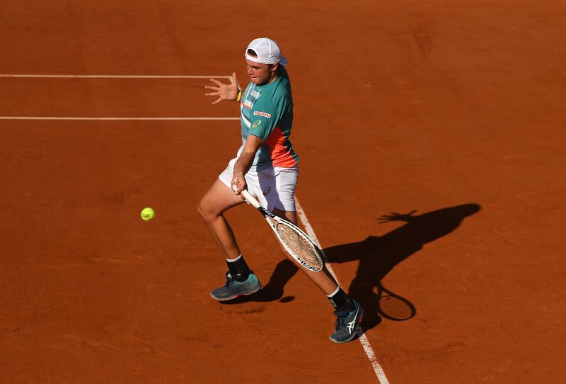 Dominic Stricker plays a forehand during the 2020 French Open