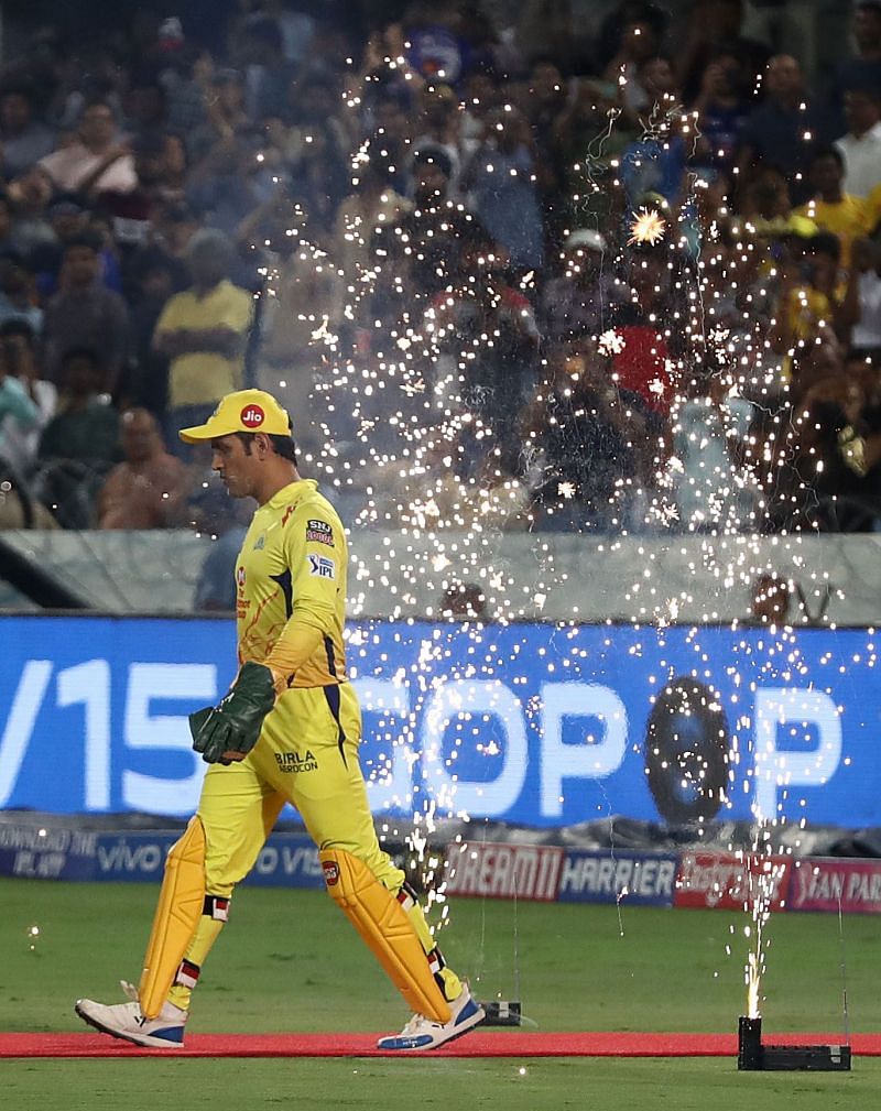 MS Dhoni walks on to the field leading the Chennai Super Kings.