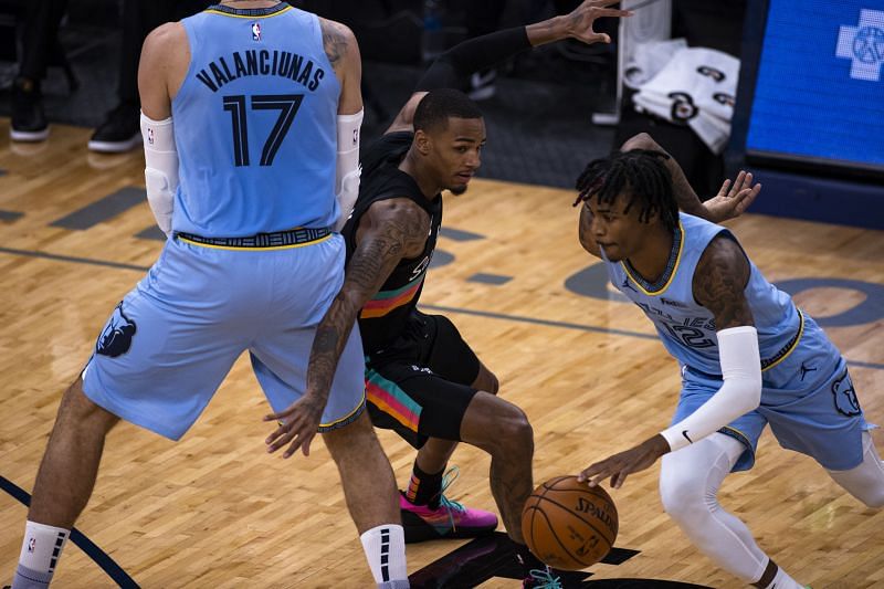 Memphis Grizzlies&#039; Jonas Valanciunas setting a screen for Ja Morant.