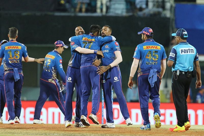 Mumbai Indians players celebrate their win over KKR by 10 runs