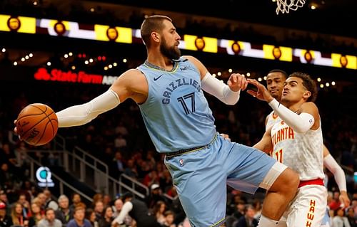 Jonas Valanciunas #17 tries to keep the ball in play