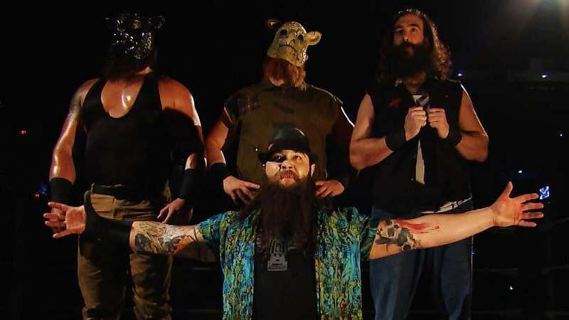 Braun Strowman (left) debuted in WWE as a Wyatt Family member