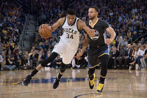 Giannis Antetokounmpo and Stephen Curry. Photo Credit: Kyle Terada-USA TODAY Sports.