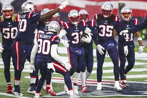 The New England Patriots celebrate against the New York Jets on Jan. 3, 2021.