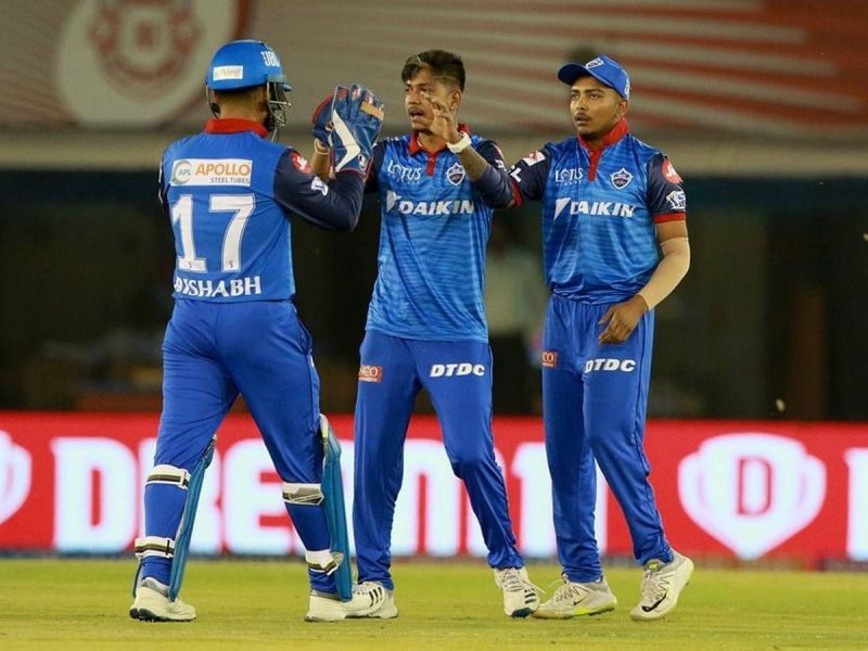 Sandeep Lamichhane (center) celebrating the wicket of Punjab's Sam Curran in IPL 2019