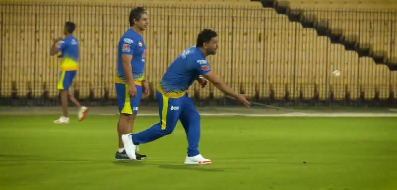 MS Dhoni playing a game of &#039;Bocce&#039; with Tommy Simsek (L)