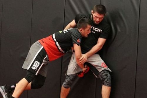 Usman Nurmagomedov during a training session with his cousin Khabib