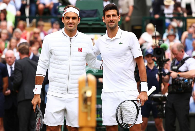 Roger Federer (L) and Novak Djokovic at Wimbledon