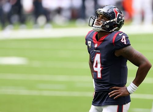 QB Deshaun Watson looks to the heavens during his team's game against the New England Patriots