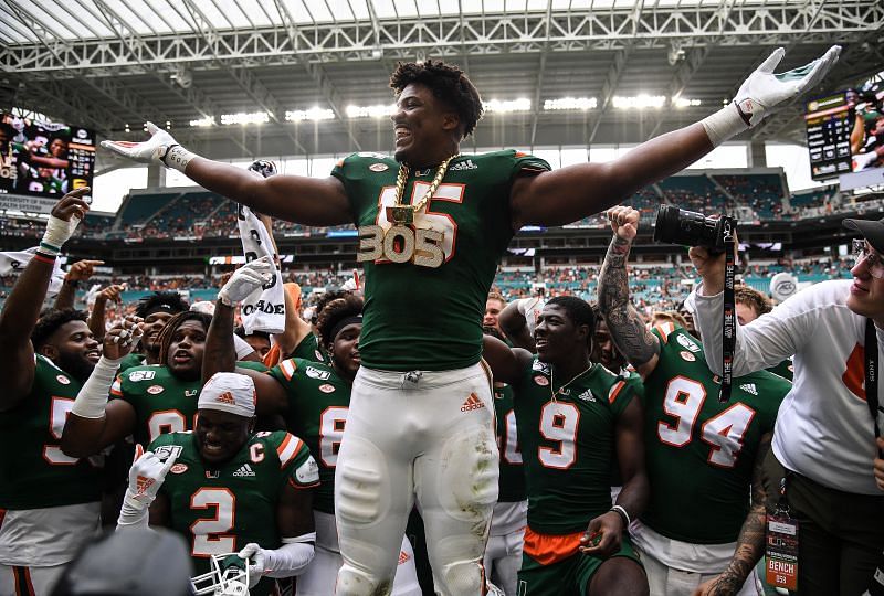 Miami edge rusher Gregory Rousseau celebrates with the &quot;Turnover Chain&quot; after a sack and fumble recovery against Central Michigan on Sept. 21, 2019, in Miami, Florida