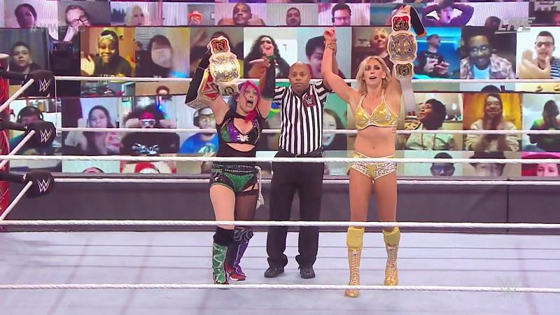 Asuka and Charlotte with the Women&#039;s Tag Team Championship