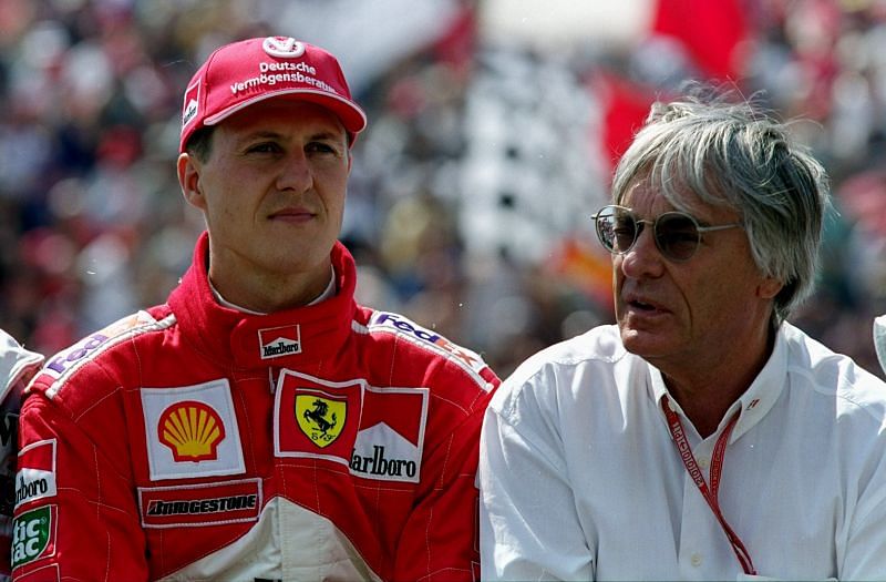 Michael Schumacher with Bernie Ecclestone before the 2000 Hungarian Grand Prix. Photo: Mark Thompson /Allsport.
