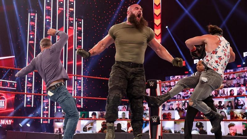Braun Strowman taking out Elias and Shane McMahon.