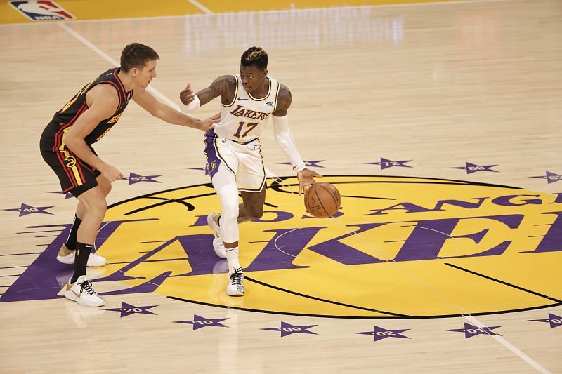 Dennis Schroder #17 dribbles against Bogdan Bogdanovic #13