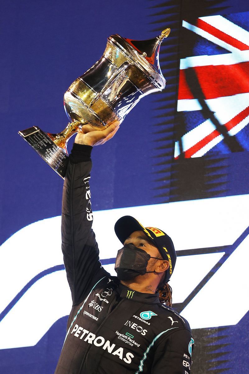 Lewis Hamilton on the podium after claiming his first win of 2021 at Bahrain Grand Prix. Photo: Bryn Lennon/Getty Images. 