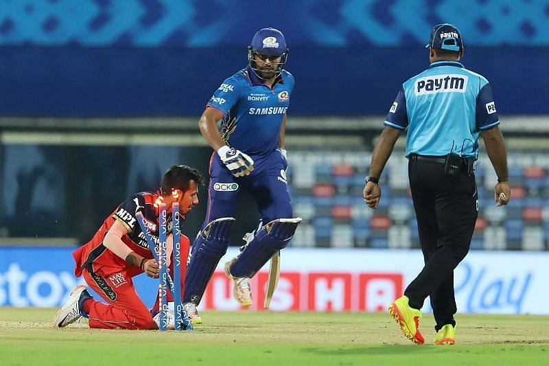 Rohit Sharma was run out after a mix-up with Chris Lynn.