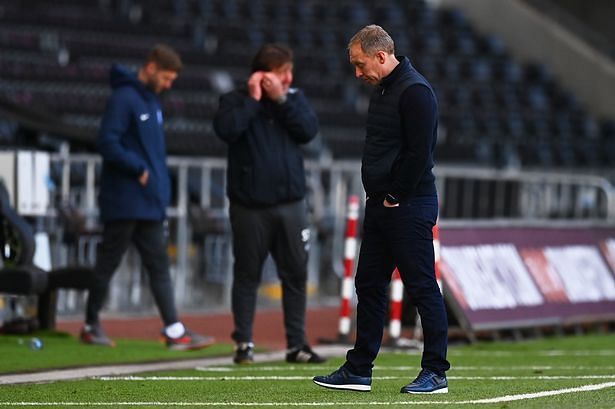 A dejected Steve Cooper following Swansea&#039;s latest EFL Championship defeat to Preston North End