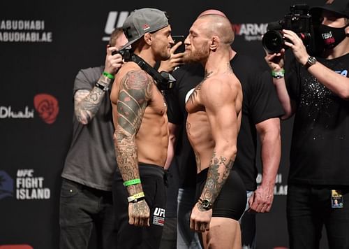 Dustin Poirier (Left) and Conor McGregor (Right) during UFC 257 weigh-in face-off