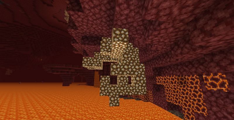 Glowstone blobs are generated by hanging under ceilings and terrain (Image via Minecraft)