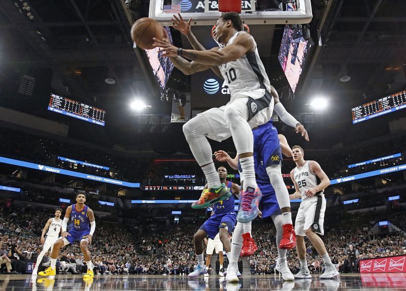 DeMar DeRozan #10 looks to make a pass.