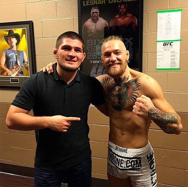 Khabib Nurmagomedov and Conor McGregor pose after UFC 178