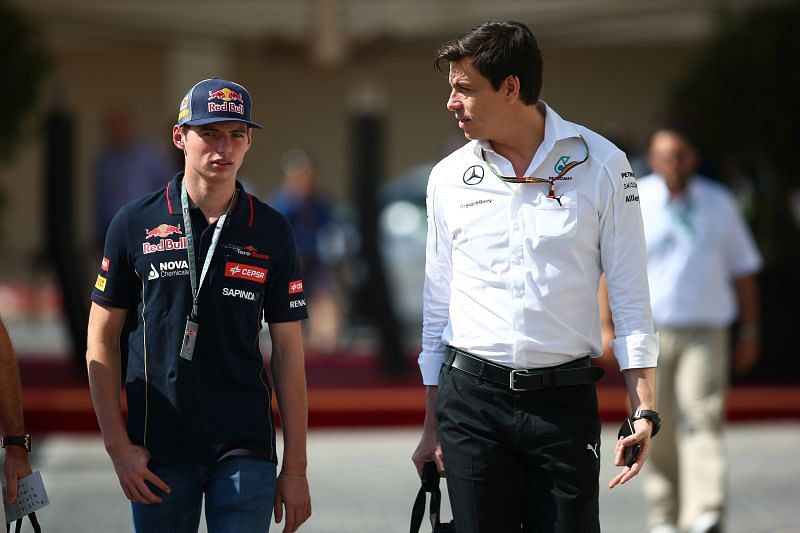 Max Verstappen speaks with Toto Wolff. Photo: Mark Thompson/Getty Images.