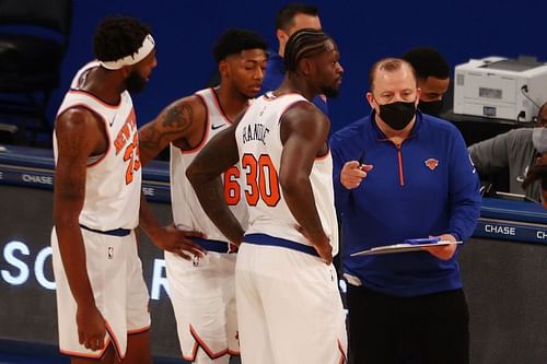 New York Knicks Head Coach Tom Thibodeau speaks with Julius Randle #30 during the game.