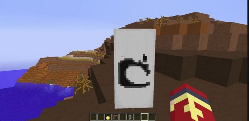 Players can craft the Mojang logo banner with a golden apple