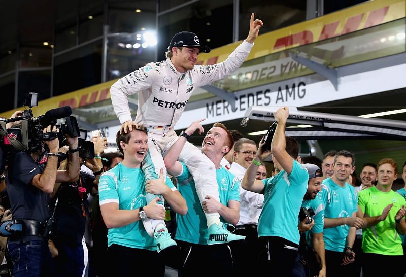 Nico Rosberg of Germany celebrates with his team after clinching his world championship at the 2016 Abu Dhabi Grand Prix. Photo: Clive Mason/Getty Images.
