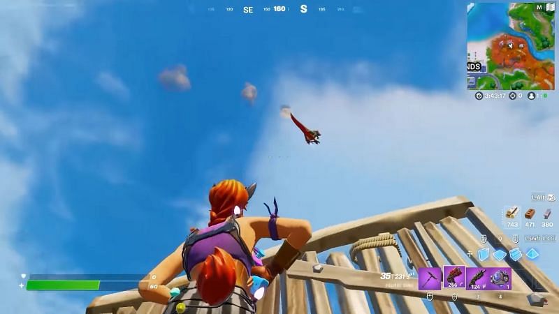 Raptor being shot into the air by the Spire pad (Image via YouTube, Top5Gaming)