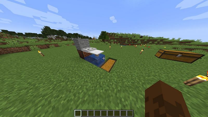 Fish farms can be built in Minecraft using semi-automatic or even automatic systems (Image via Minecraft)
