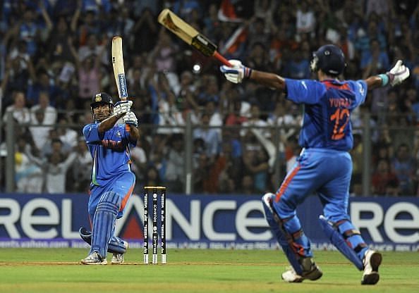 MS Dhoni&#039;s six that won India the 2011 World Cup. An ecstatic Yuvraj Singh celebrates in the background
