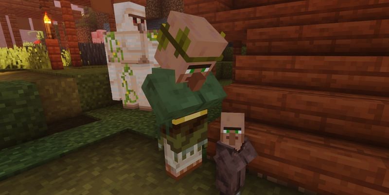 Shown: An Iron Golem watching over Baby Villagers (Image via Minecraft)
