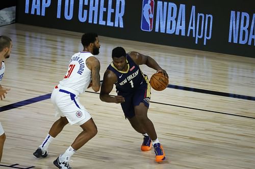 Marcus Morris Sr. #31 defends against Zion Williamson #1.