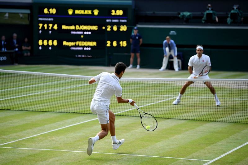 Novak Djokovic and Roger Federer competing at the 2019 Wimbledon final