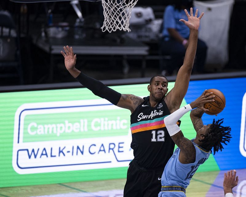 LaMarcus Aldridge #12 defends as Ja Morant #12.