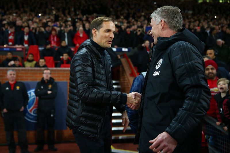 Thomas Tuchel shakes hands with Ole Gunnar Solksjaer.