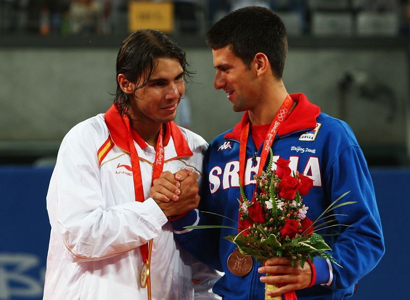 Rafael Nadal being congratulated by bronze medalist Novak Djokovic at the Beijing 2008 Olympics