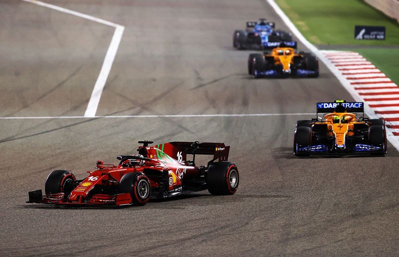 Charles Leclerc of Scuderia Ferrari leads the Mclarens in Bahrain, 2021. Photo: Bryn Lennon/Getty Images.