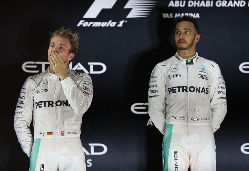 Lewis Hamilton and Nico Rosberg on the podium during the 2016 Abu Dhabi Grand Prix at Yas Marina Circuit. Photo: Clive Mason/Getty Images.