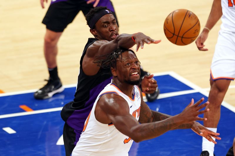 Julius Randle (#30) of the New York Knicks in action against Pascal Siakam (#43) of the Toronto Raptors