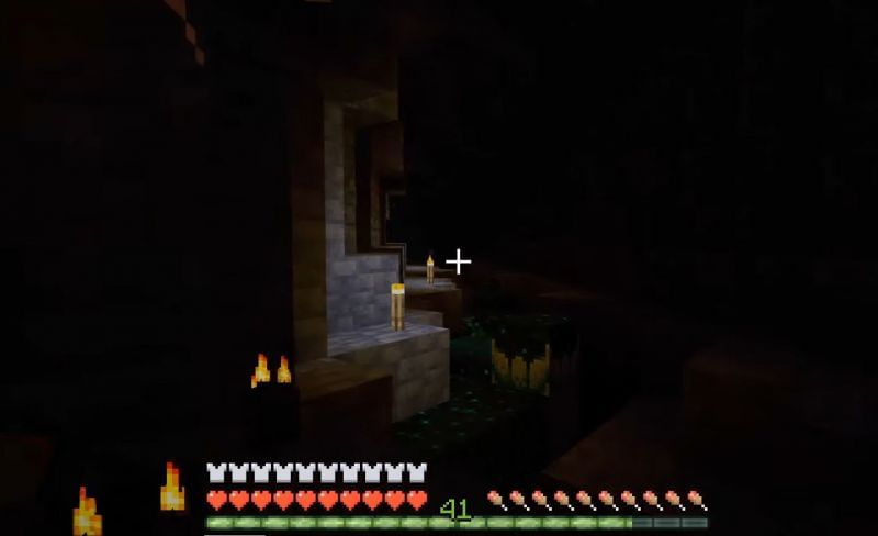 Shown: Light dimming in the Deep Dark Caves (Image via Mojang)