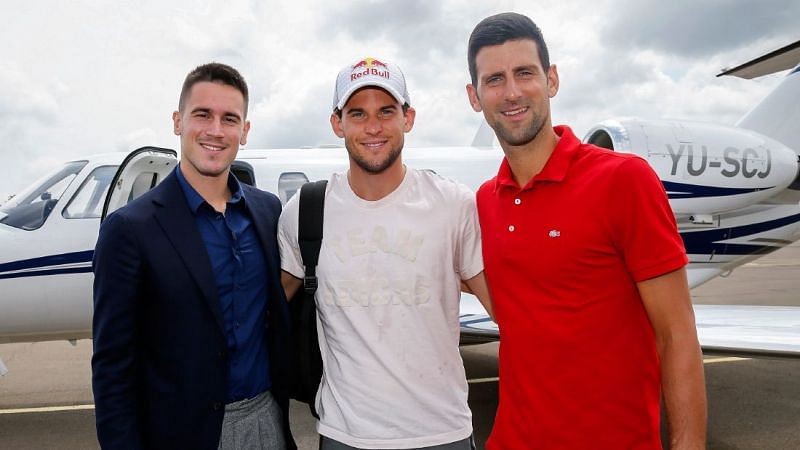 Djordje Djokovic poses with Dominic Thiem and Novak Djokovic